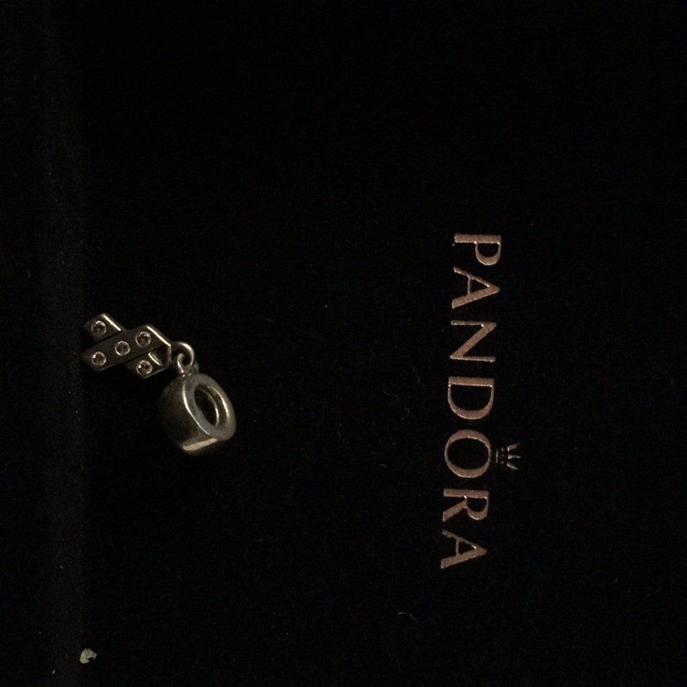 Pandora breast cancer awareness charm.